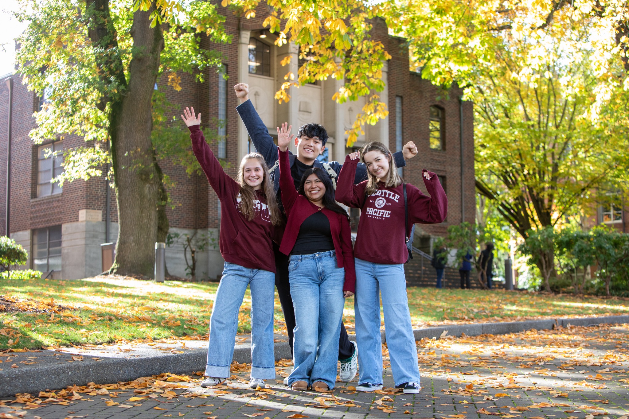 Seattle Pacific University students celebrating together on campus